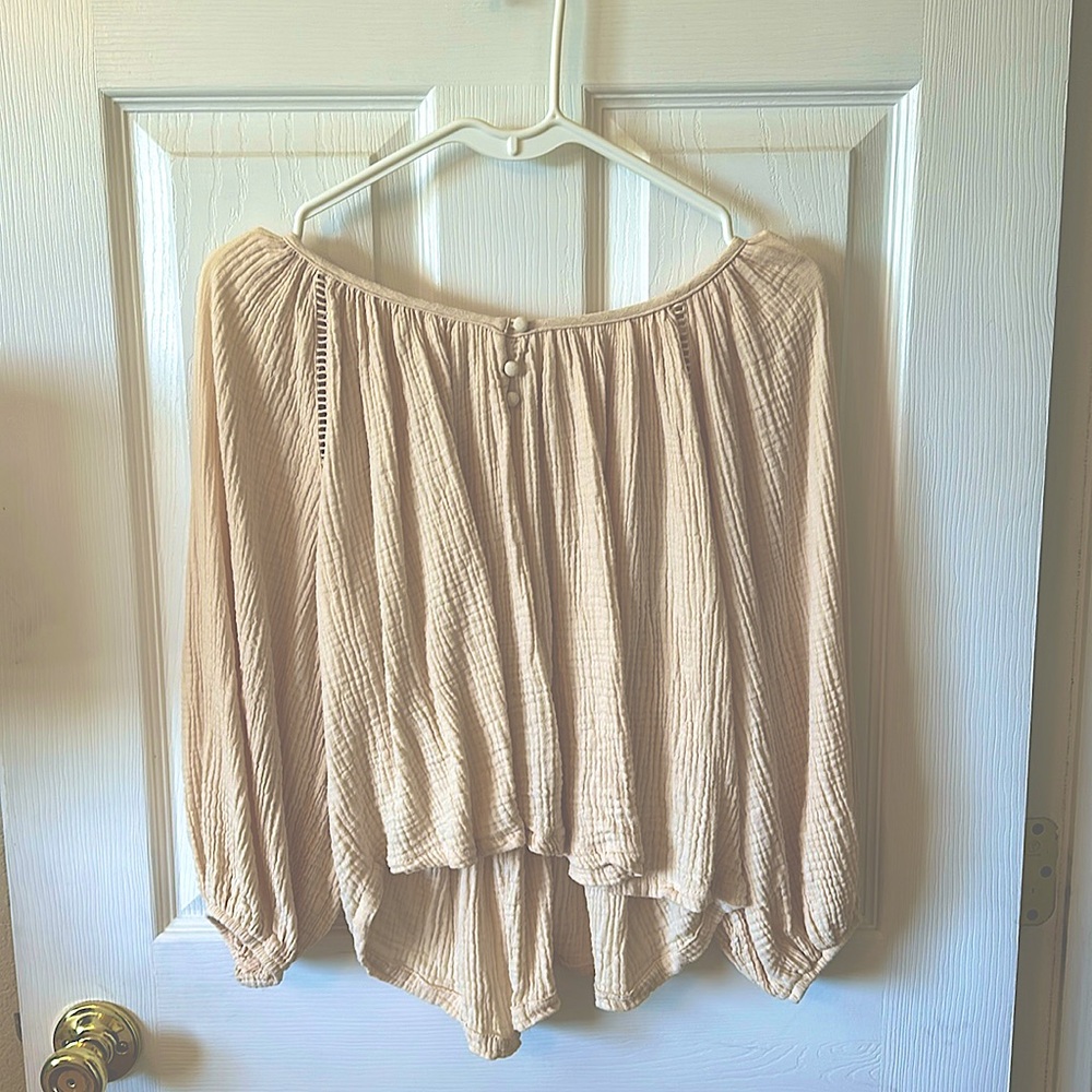 Never worn, Lush top that is shorter in the front and longer in the back.